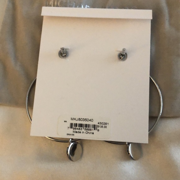 Michael Kors Silver Tone Brass Hoop Earrings With Round MK Charm & Crystal NWT - Picture 10 of 13